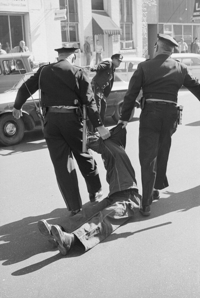 Police Dragging African-American Man