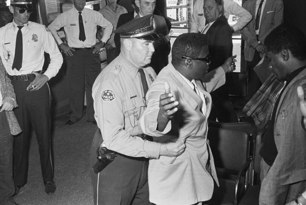 Freedom Rider Searched By a Policeman