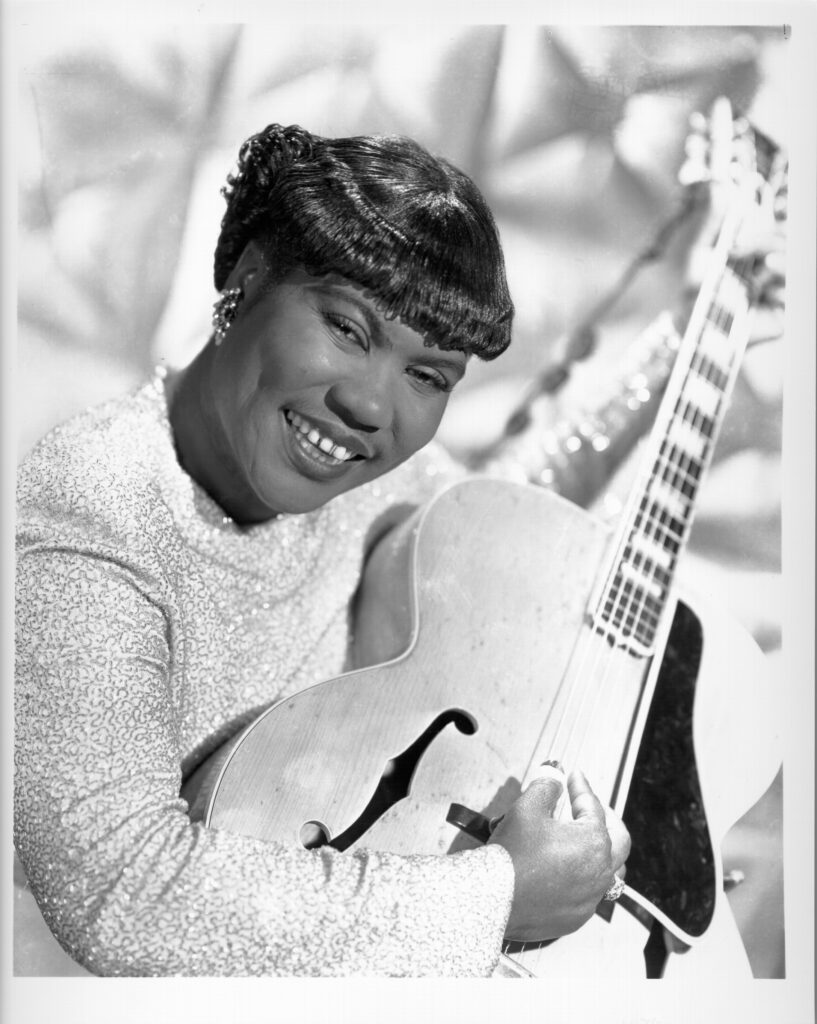 Sister Rosetta Tharpe poses for a portrait holding a guitar in circa 1950 New York City, New York.