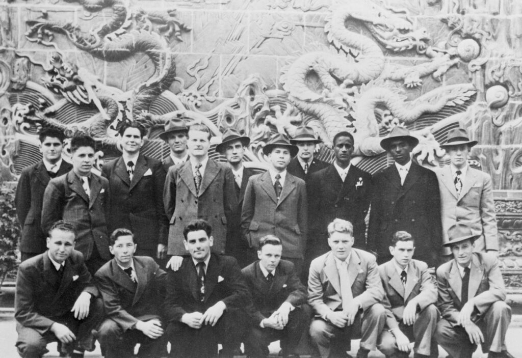 Richard Tenneson, (second from left, standing), poses with a group of American POW's who refused repatriation during the Korean War, while on a sightseeing trip to Beijing.