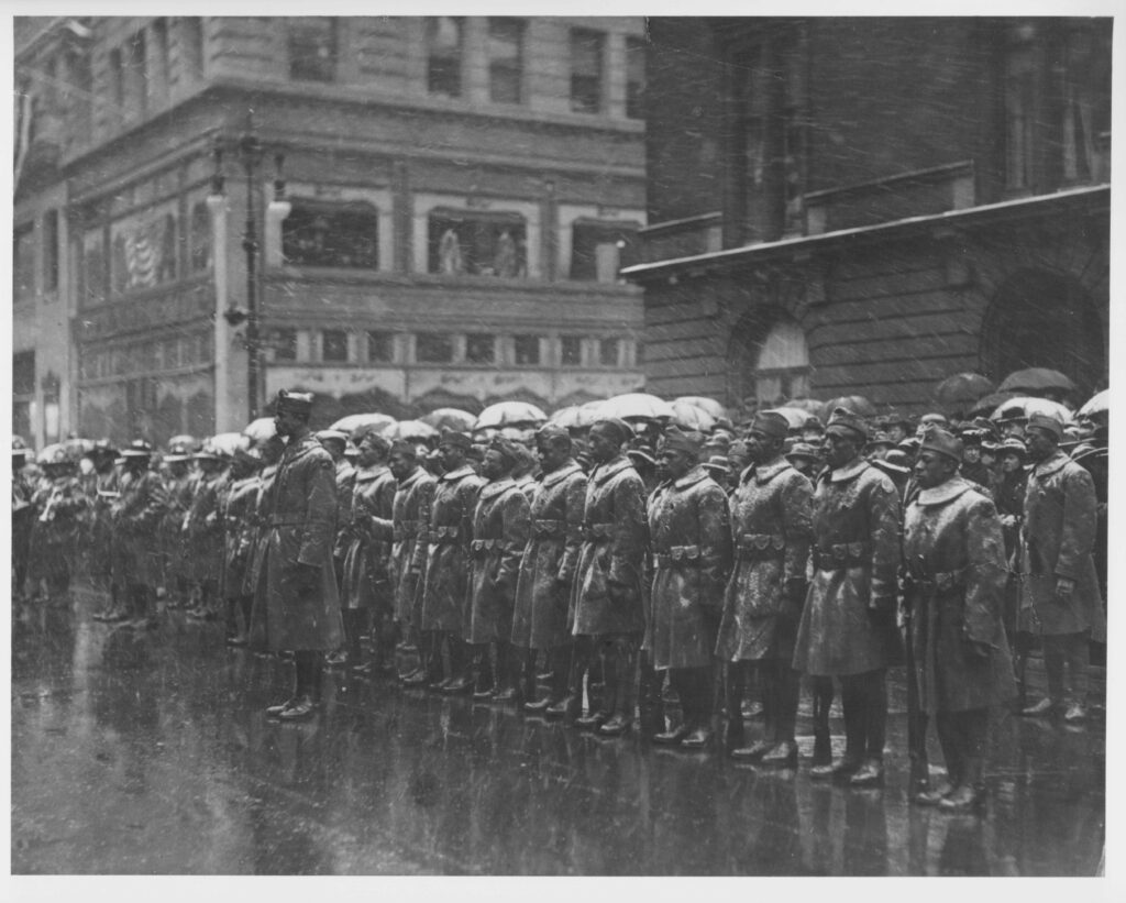 African American 'Buffalo Soldiers', of the 92nd Infantry Division, in a victory parade on 5th Avenue following World War One, New York City, USA, circa 1918-1919.