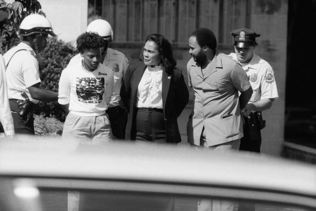 6/26/1985-Washington, DC: Coretta Scott King, widow of the late Martin Luther King, Jr., and children Bernice & Martin are arrested as they protest apartheid at the South African Embassy in D.C.